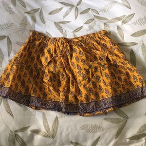 Orange skirt with multicolored flowers